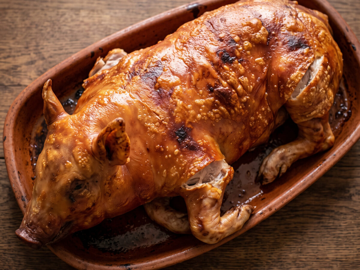 Cochinillo asado vom Drehspieß